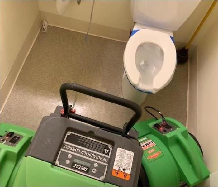 toilet room with green equipment 