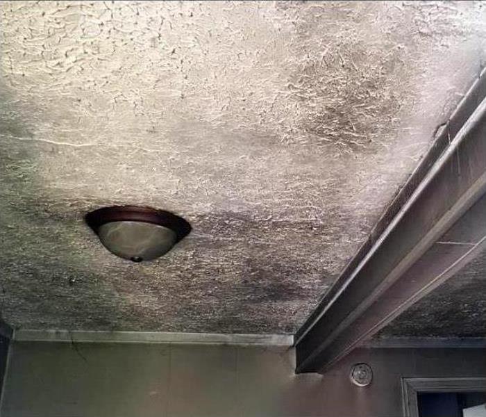 Soot covering ceiling 
